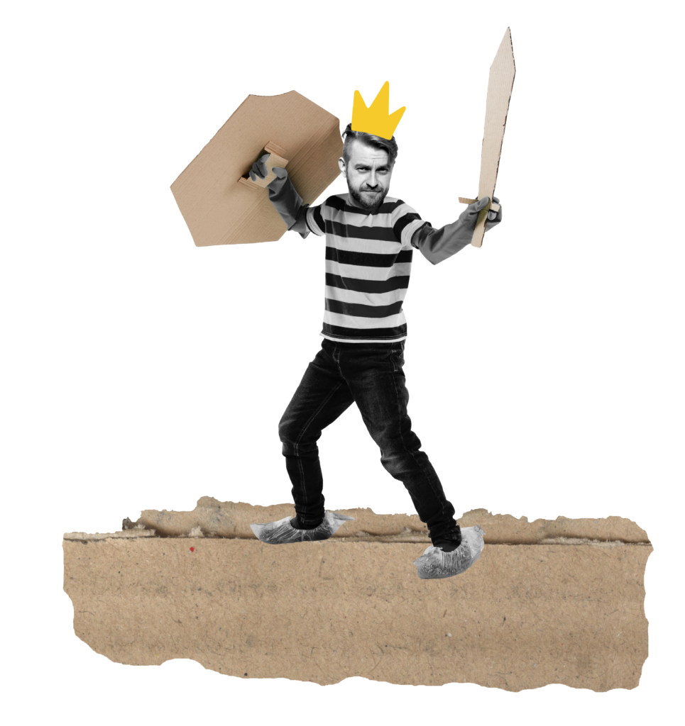 man in a crown with cardboard sword and shield